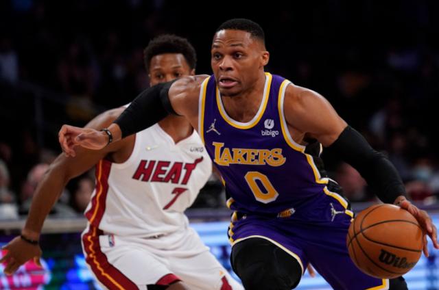 盛世棋牌-蒙克爆发韦少回暖 热火罚球断电助湖人逃出生天